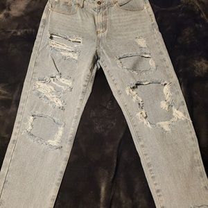 High rise boyfriend distressed jeans by Nasty Gal